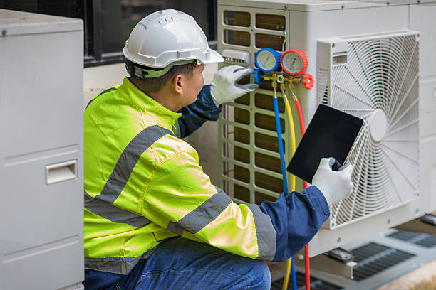 Professional Air Conditioning Repair technician working in Monroeville, IN